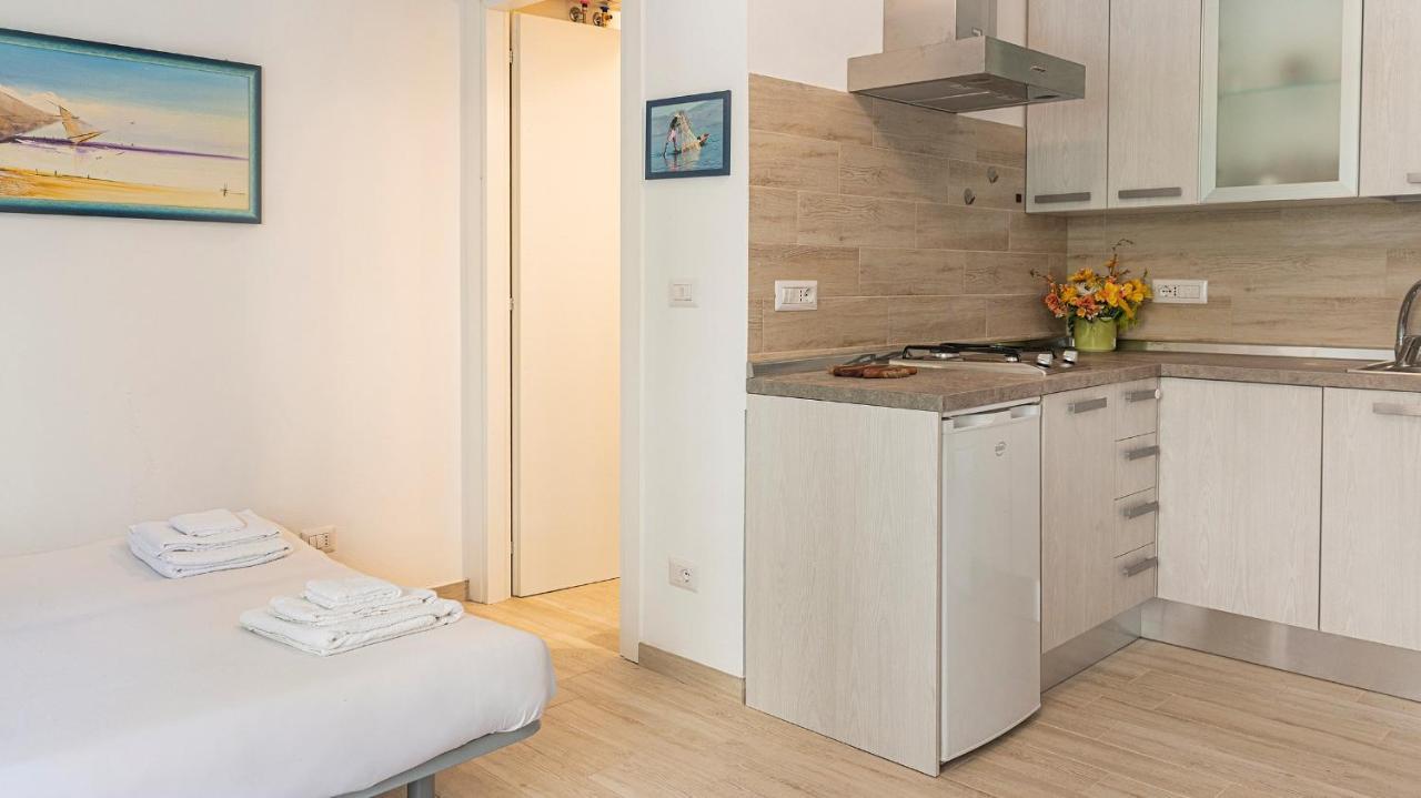 Costa 7A Apartment Alghero Bagian luar foto
