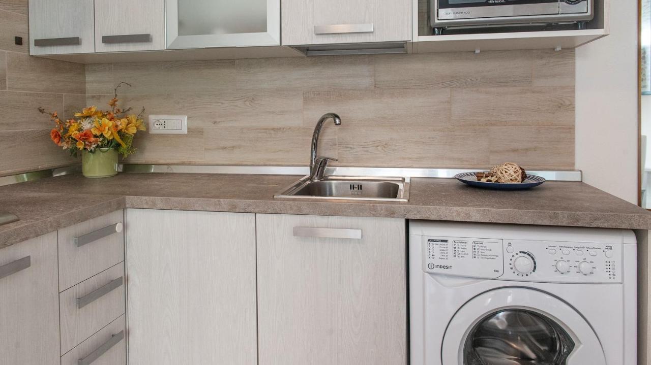 Costa 7A Apartment Alghero Bagian luar foto