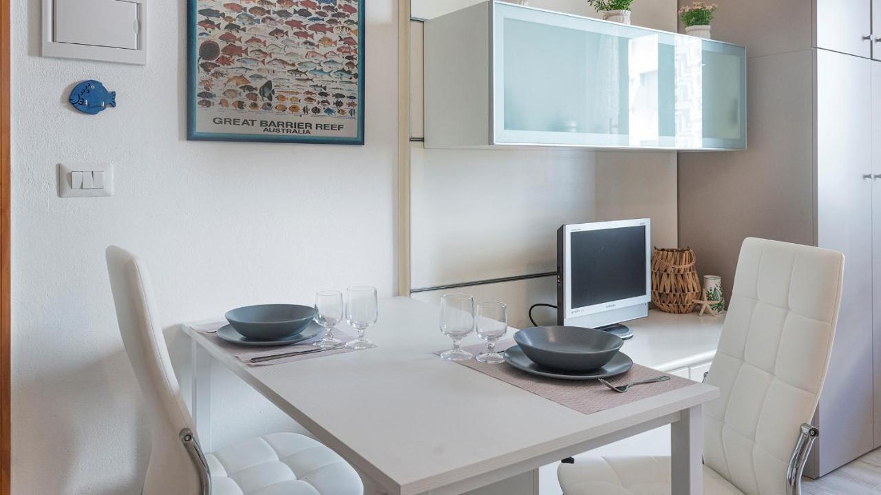Costa 7A Apartment Alghero Bagian luar foto