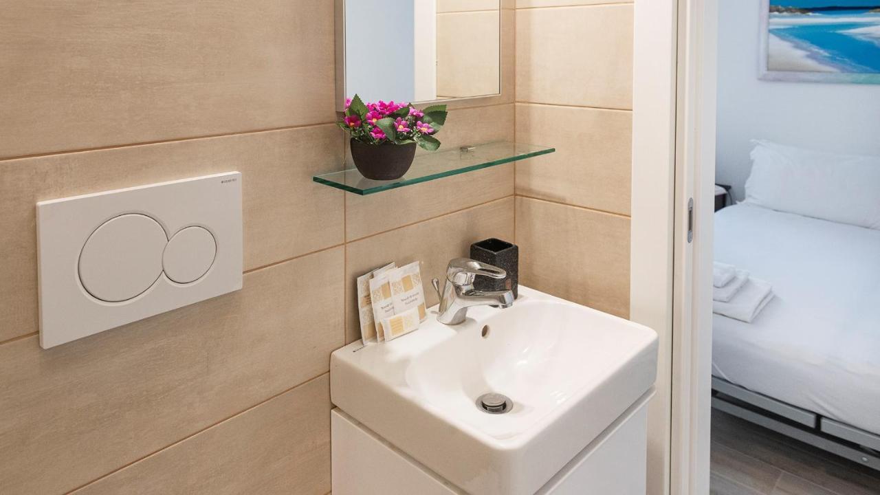 Costa 7A Apartment Alghero Bagian luar foto