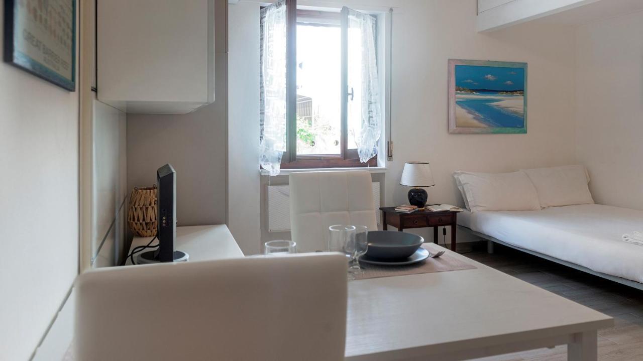 Costa 7A Apartment Alghero Bagian luar foto