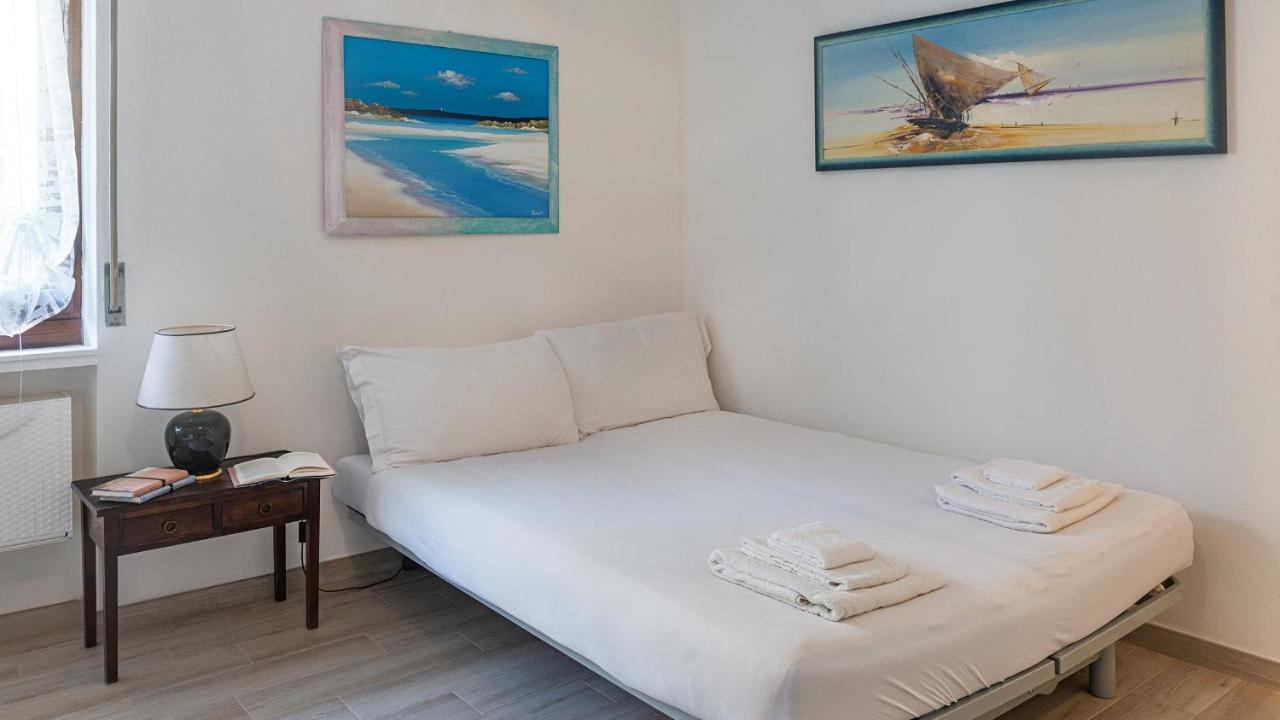 Costa 7A Apartment Alghero Bagian luar foto
