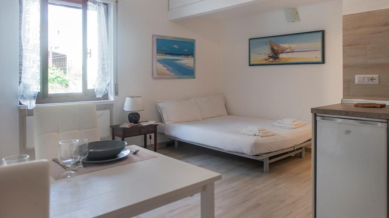 Costa 7A Apartment Alghero Bagian luar foto